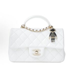 CHANEL Classic Flap CF with little lion pendant, quilted leather and chain, single crossbody bag